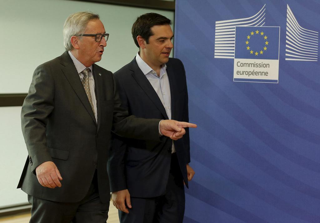 El presidente de la Comisión Europea, Jean-Claude Juncker y Alexis...