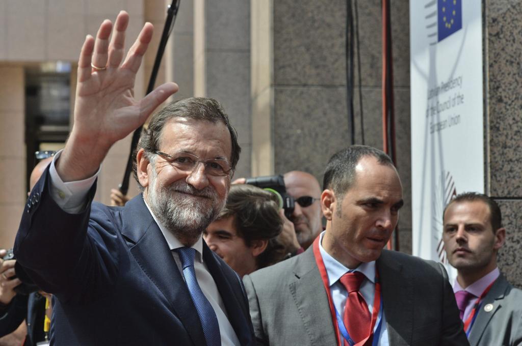 El presidente de España, Mariano Rajoy, a su llegada a la sede del...