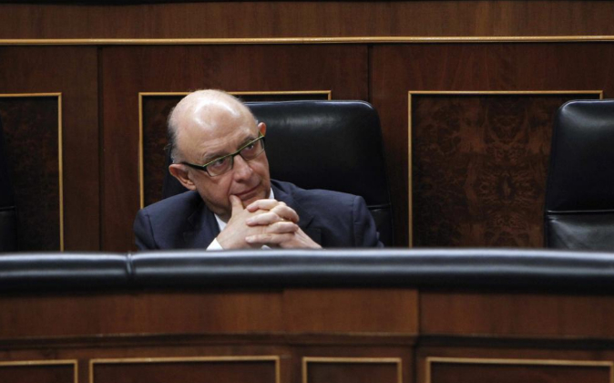 El ministro de Hacienda, Cristóbal Montoro, ayer en el Congreso de...