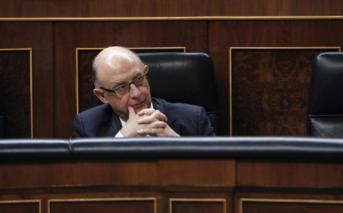 El ministro de Hacienda, Cristóbal Montoro, en su escaño del...