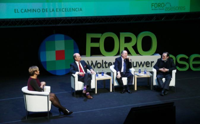 Los economistas Carlos Rodríguez Braun, José Mª Gay de Liébana y...