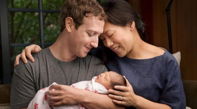 Zuckerberg y su esposa Priscilla con su hija Max.