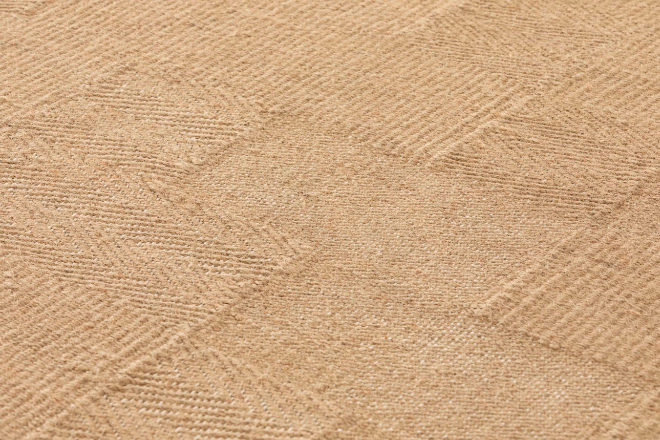 Detalle de una de las alfombras de Roots, en apariencia simple, pero que pone a prueba la habilidad de los tejedores con los cambios de direccin del trenzado. 