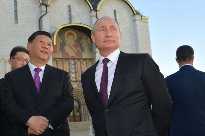 El presidente ruso, Vladimir Putin y su homólogo chino, Xi Jinping.