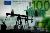 Pozos petrolíferos con un billete de 100 euros de fondo
