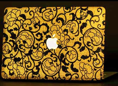 MacBook Air con carcasa de oro y diamantes