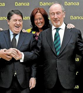Mercedes de la Merced, en el centro de la foto y a la izquierda de Rodrigo Rato, es la exteniende Alcalde del Ayuntamiento de Madrid