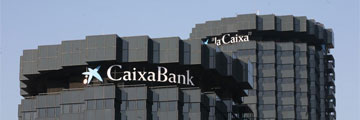 Caixabank gana 620 millones y baja la mora al 9,7%